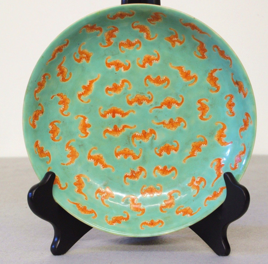 Chinese Famille Rose Porcelain Plate: Chinese green base famille rose porcelain plate , decorated with bats and flowers. Six red character mark on the base. 8" diam.