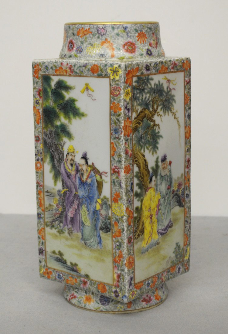 Chinese Famille Rose Square Porcelain Vase: Chinese famille rose square porcelain vase. Each side decorated with figure and landscape view around by flowers. Six re character under glaze mark on the base. 13" height x 5.1" x 5.1".