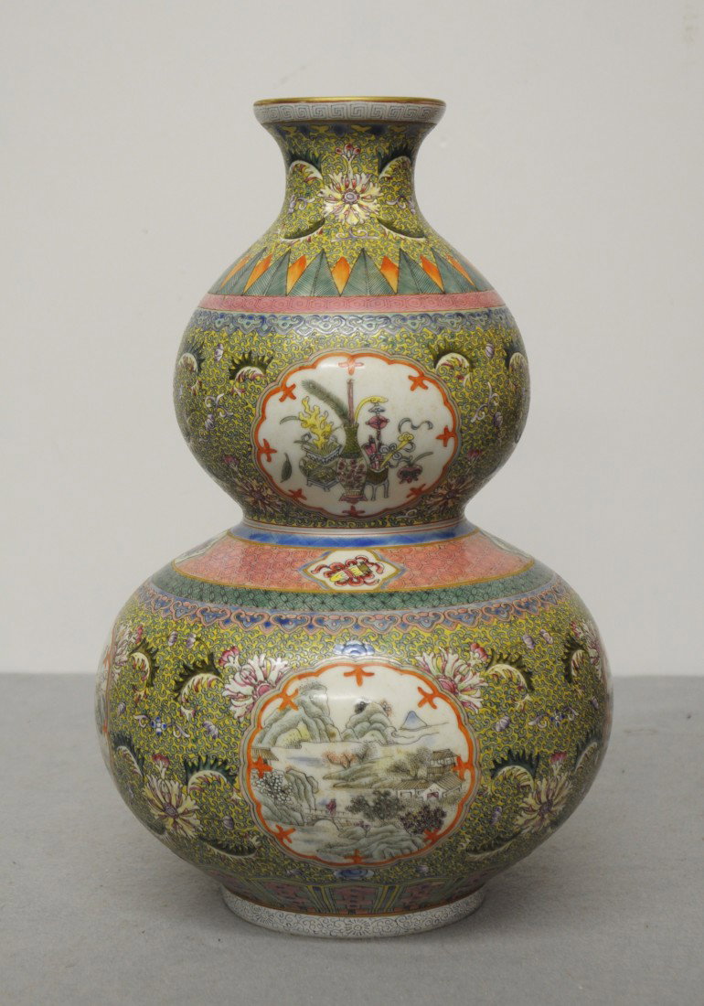 Chinese Famille Rose Gourd Shape Porcelain : Chinese famille rose gourd shape porcelain vase, decorated with open window of landscape view. Six red character mark on the base. 12.5" height.
