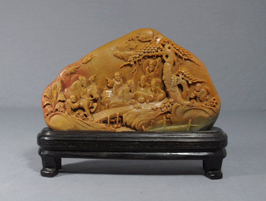 Nice Carved Chinese Shou-Shan Stone Table O: Nice carved fan shape Chinese shou-shan stone table ornament, decorated with figures. Early 20th century. Good condition. 8.5" wide x 6.75" height with wood stand.