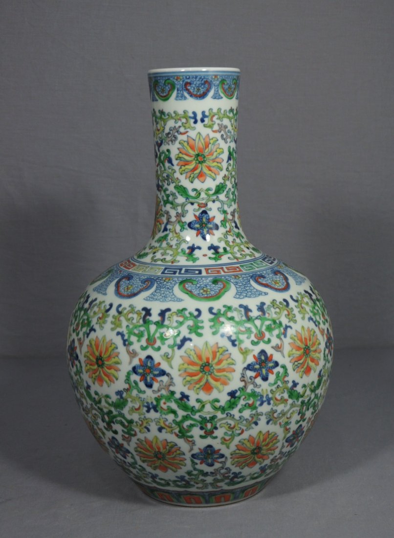 Chinese Dou-Cai Porcelain Ball Vase: Chinese Dou-Cai porcelain ball vase, decorated with flowers. Six blue character under glaze mark on the base. Good condition. 14.5" height.
