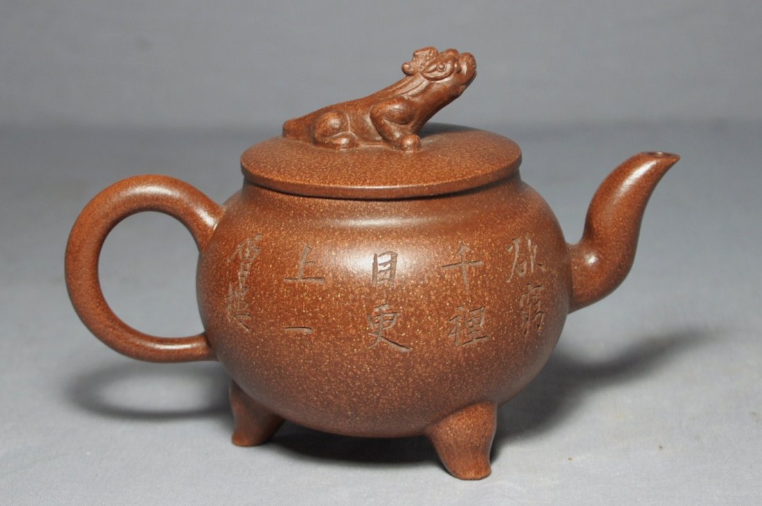 Chinese Ceramic Teapot with mark: Chinese ceramic teapot with mark. Early 20th century. 7.5" wide x 4.5" height.