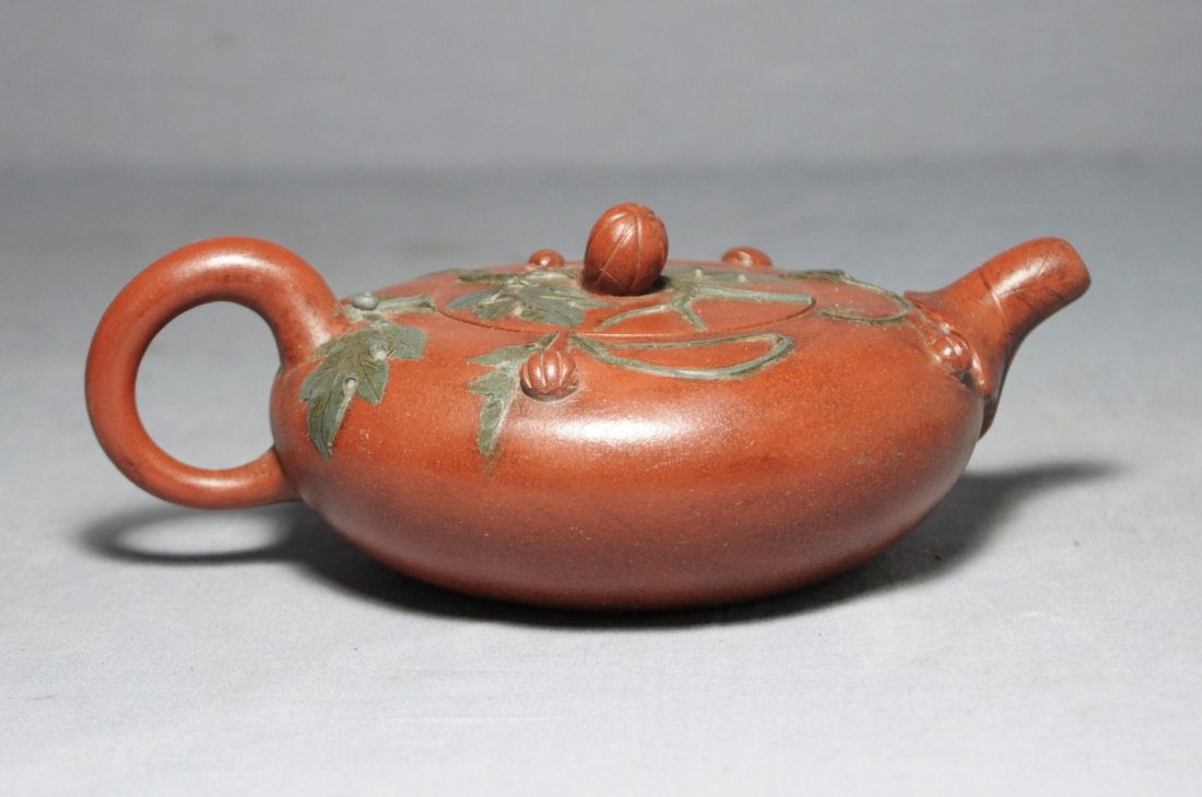 Chinese Ceramic Teapot with mark: Chinese ceramic teapot with mark. Early 20th century.Good condition. 7.5" wide x 2.75" height.