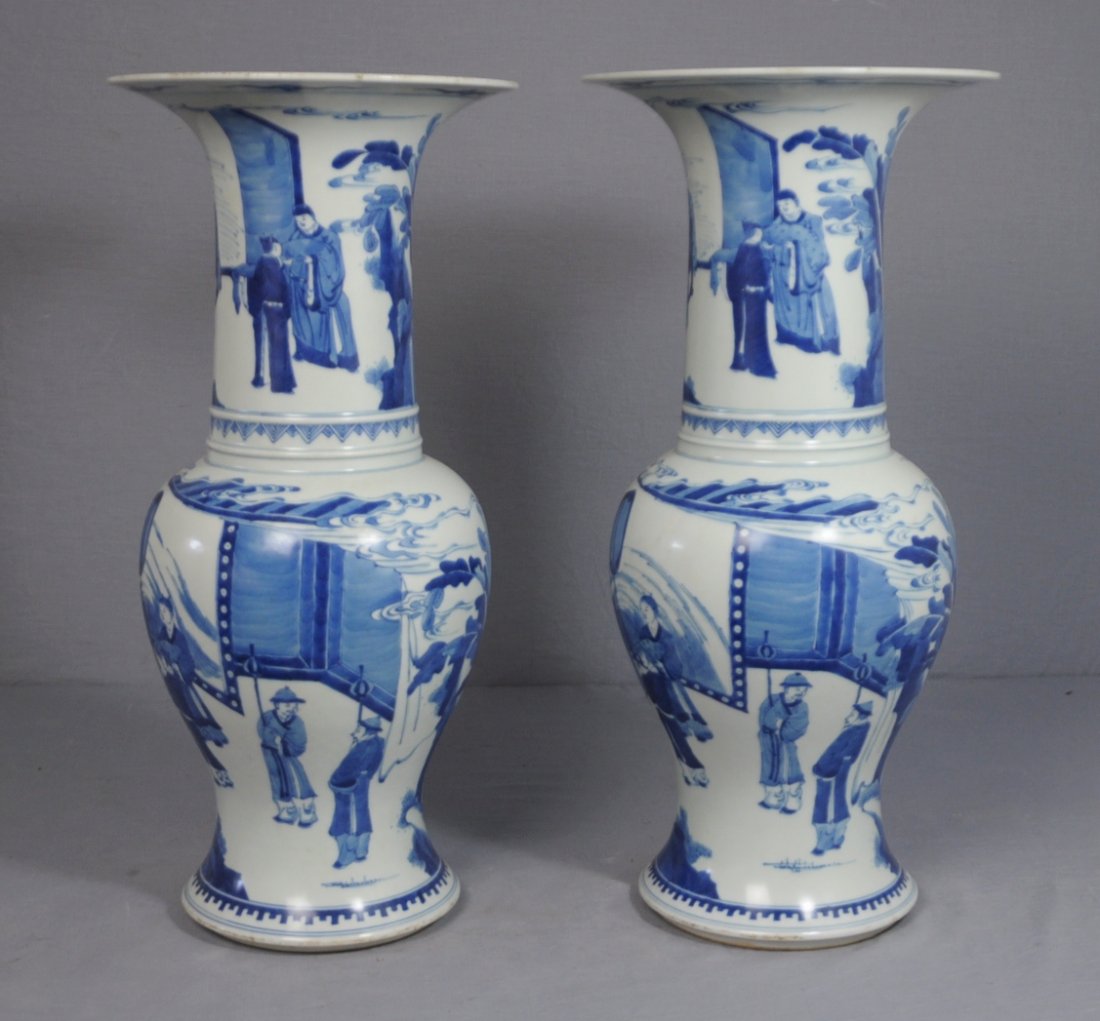 Pair of Chinese Blue and White Porcelain Beak: Pair of Chinese blue and white porcelain beaker vase, decorated with figures and landscape view. 19th century. Good condition. 18.25" height.