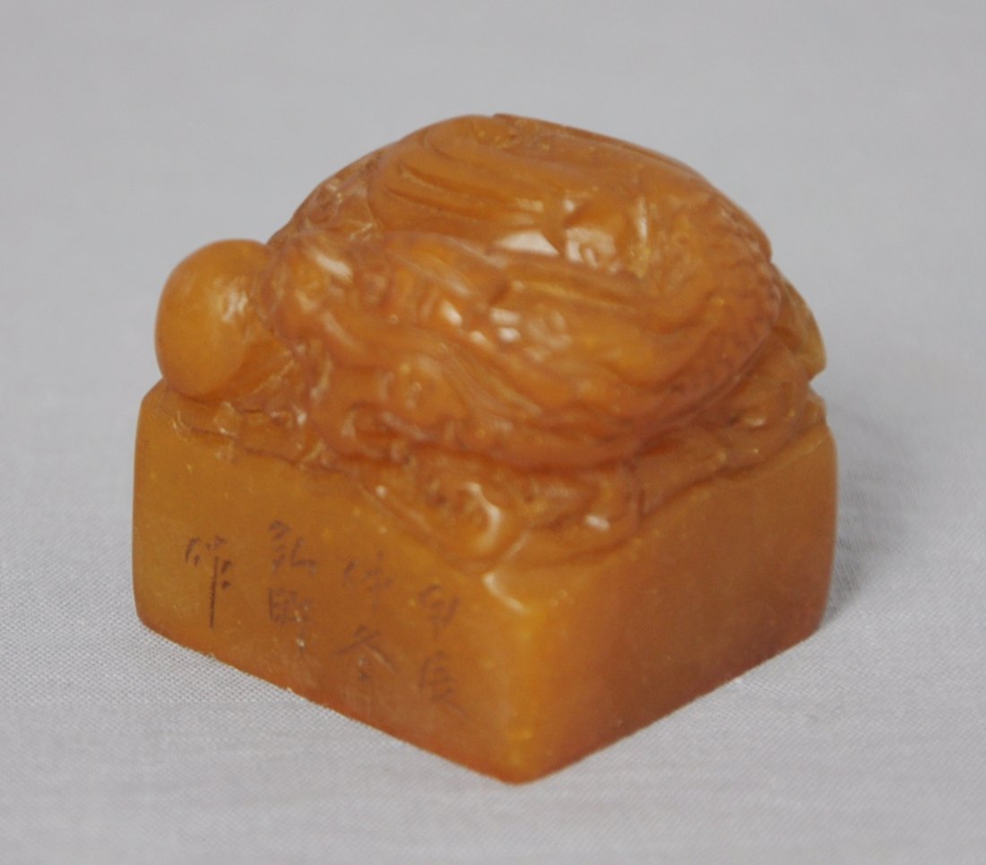 Nice Hand Carved Chinese Yellow Shou-Shan S: Nice hand carved Chinese yellow shou-shan stone seal, decorated with lion on the top. Early 20th century. 1.6" height x 1.5" x 1.6".