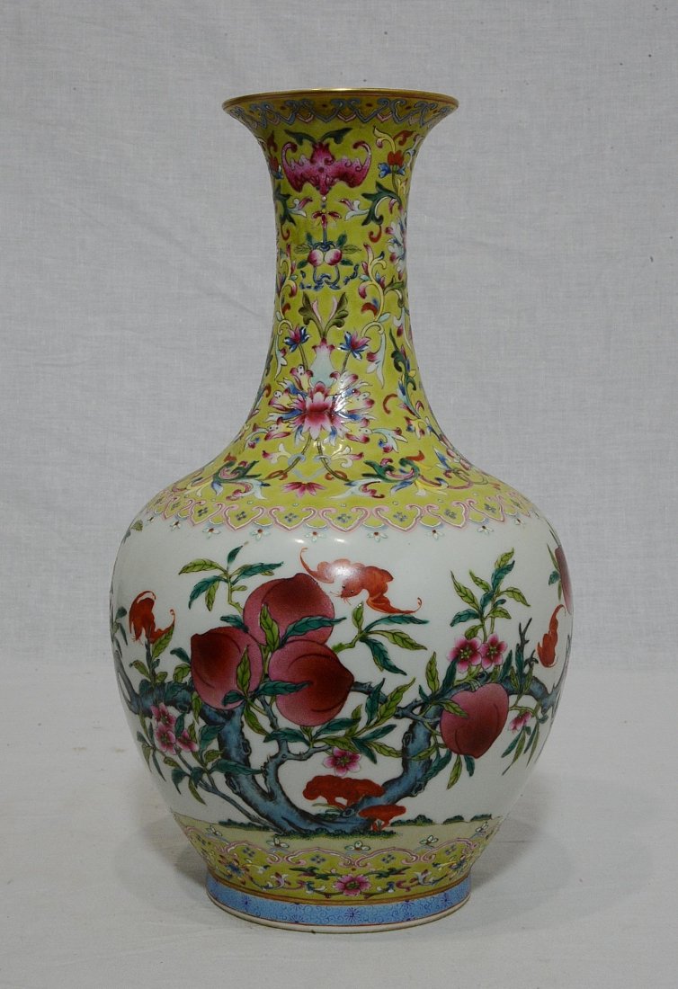 Chinese Famille Rose Porcelain Vase With Mark: Chinese famille rose porcelain vase, decorated with peach tree and bats. Six blue character under glaze mark on the base. Good condition. 12" height.