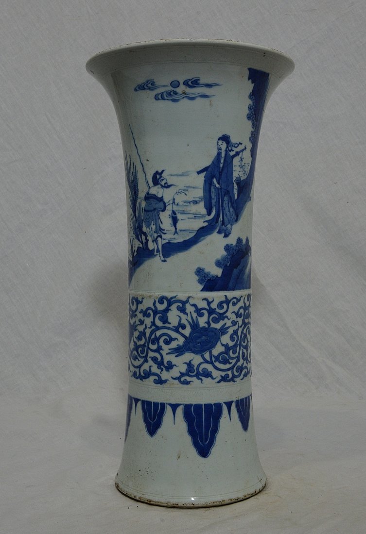 Chinese Blue and White Porcelain Beaker Vase: Chinese blue and white porcelain beaker vase, decorated with figures and landscape view. Good condition. 15.75" height.