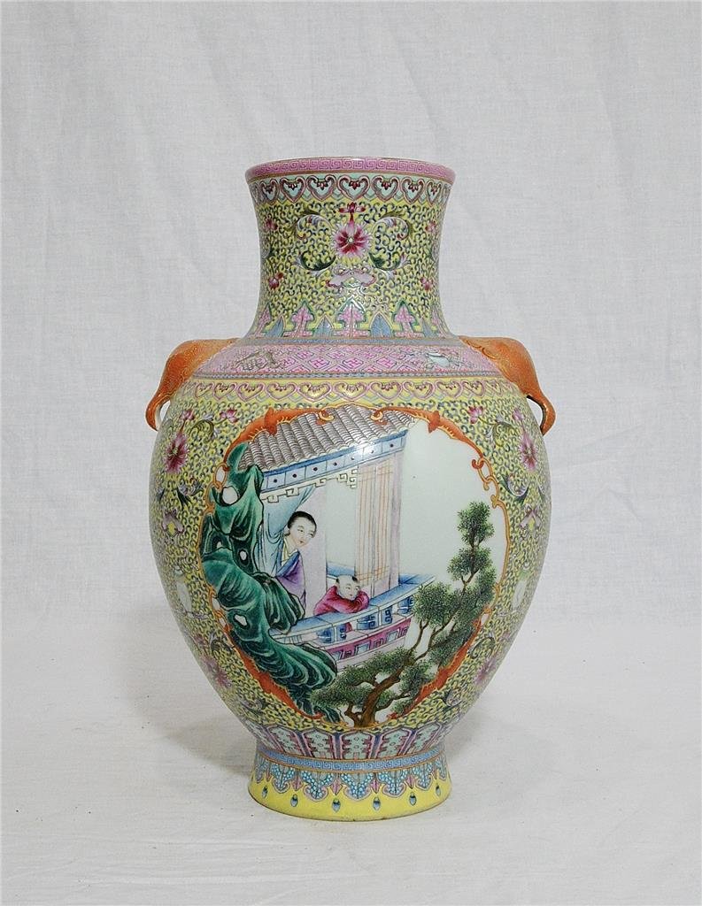 Chinese Famille Rose Porcelain Vase With Mark: Chinese famille rose porcelain vase, decorated with open window of figures around by flowers. Six red Chinese character mark on the base. Good condition. 12" height.