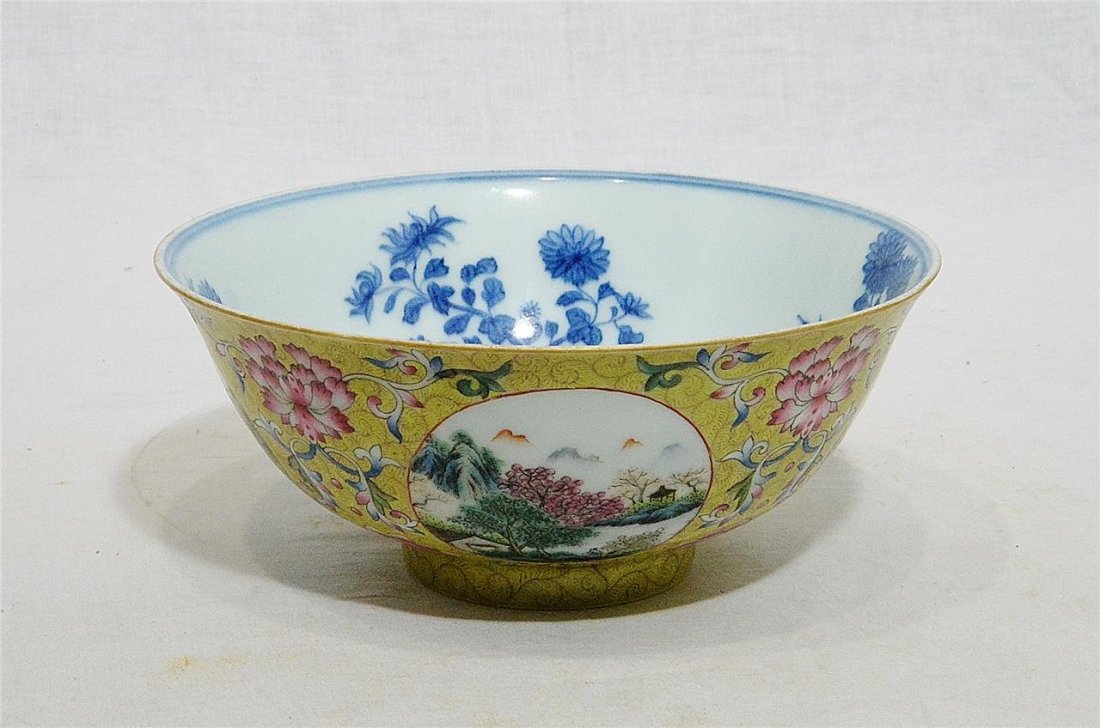 Chinese Famille Rose Porcelain Bowl With Mark: Chinese famille rose porcelain bowl, decorated with blue and white landscape interior. Four round window of figures and landscape view around the by flowers. Six blue Chinese character under glaze mar