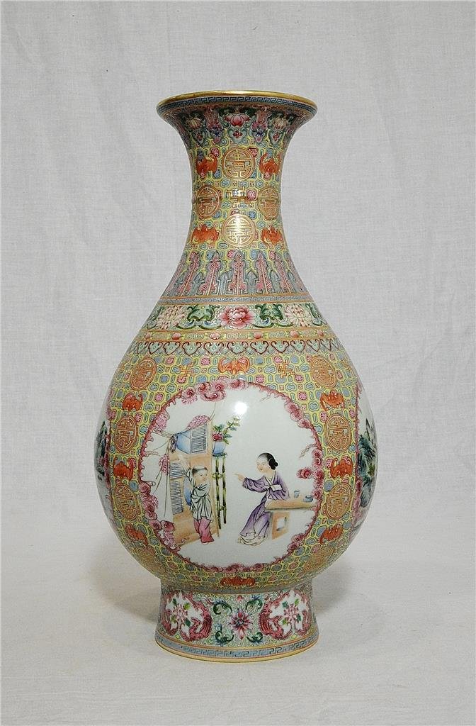 Chinese Famille Rose Porcelain Vase With Mark: Chinese famille rose porcelain vase, decorated with open window of figures and landscape around by flowers. Six red Chinese character mark on the base. Good condition. 13" height