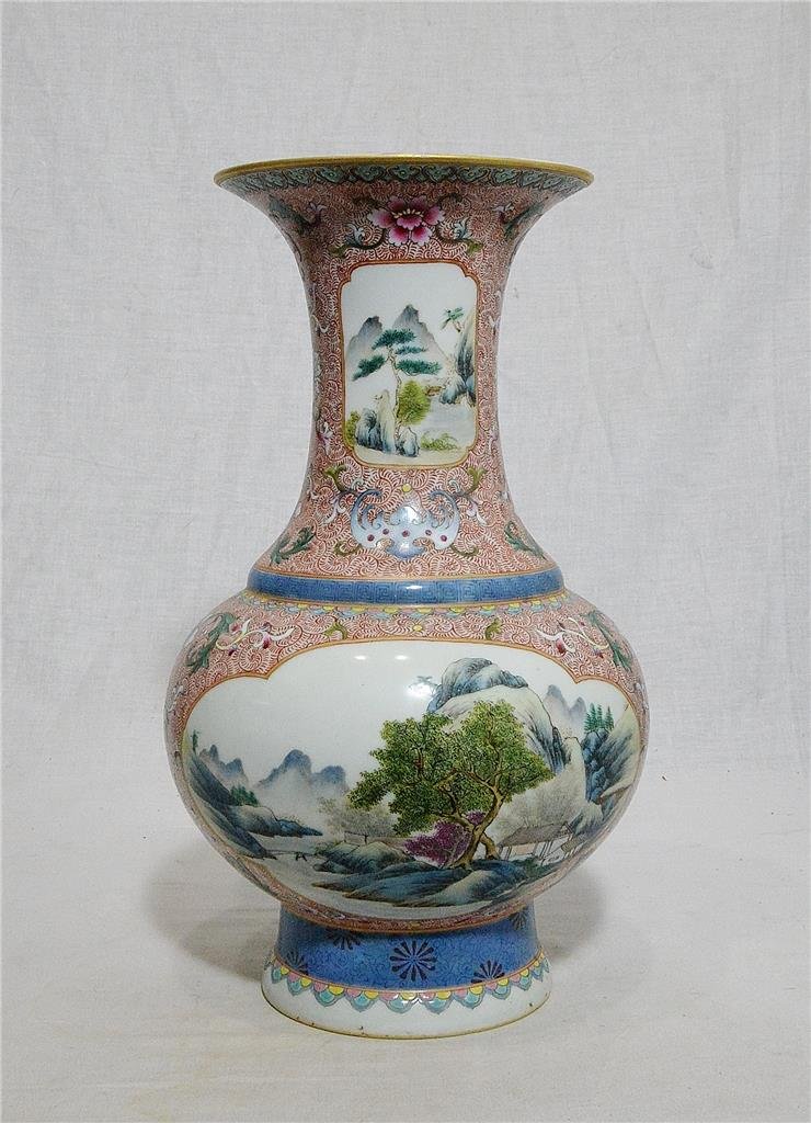 Chinese Famille Rose Porcelain Vase With Mark: Chinese famille rose porcelain vase, decorated with open window of landscape and mountain view. Six red Chinese character mark on the base. Good condition. 13" height.