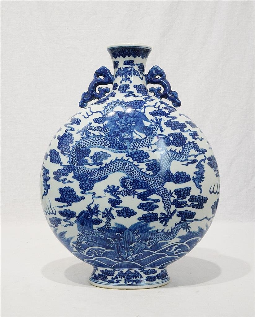 Chinese Blue and White Porcelain Flat Vase With Mark: Chinese blue and white porcelain flat vase, decorated with dragons. Six blue Chinese character under glaze mark on the base. Good condition. 14" height.