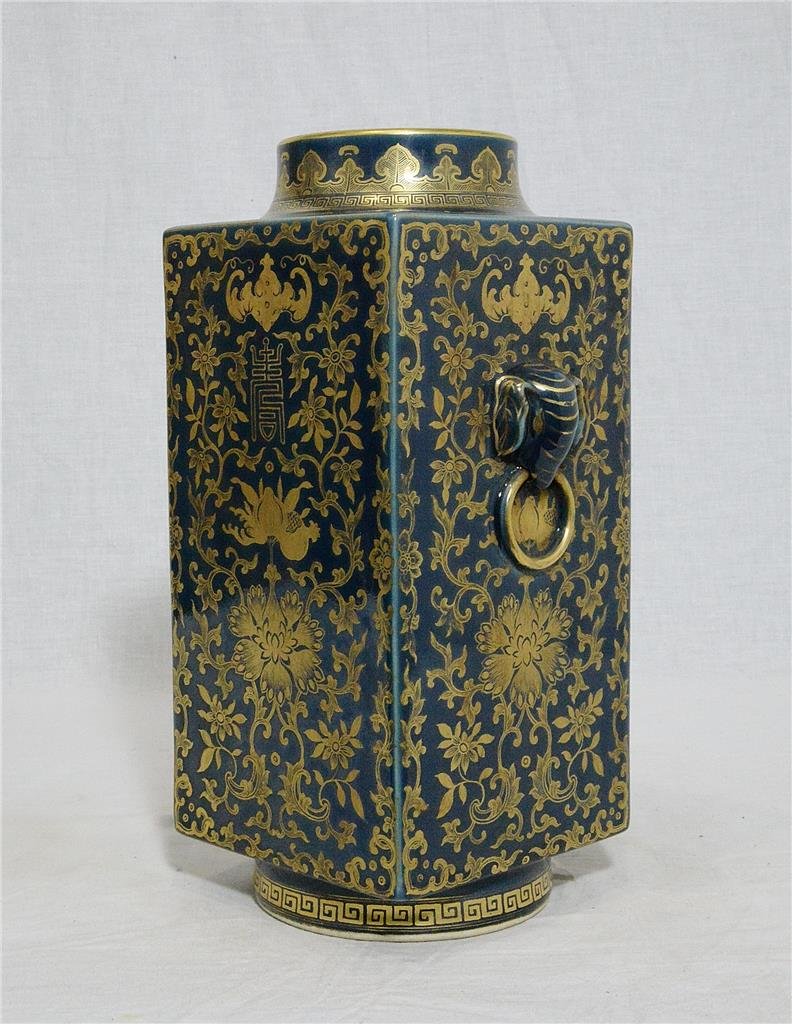 Chinese Monochrome Blue Glaze Porcelain Square Vase Wit: Chinese monochrome blue glaze porcelain square vase, decorated with elephant heads on the side around by gilt flowers. Six gilt Chinese character mark on the base. Good condition. 12" height.