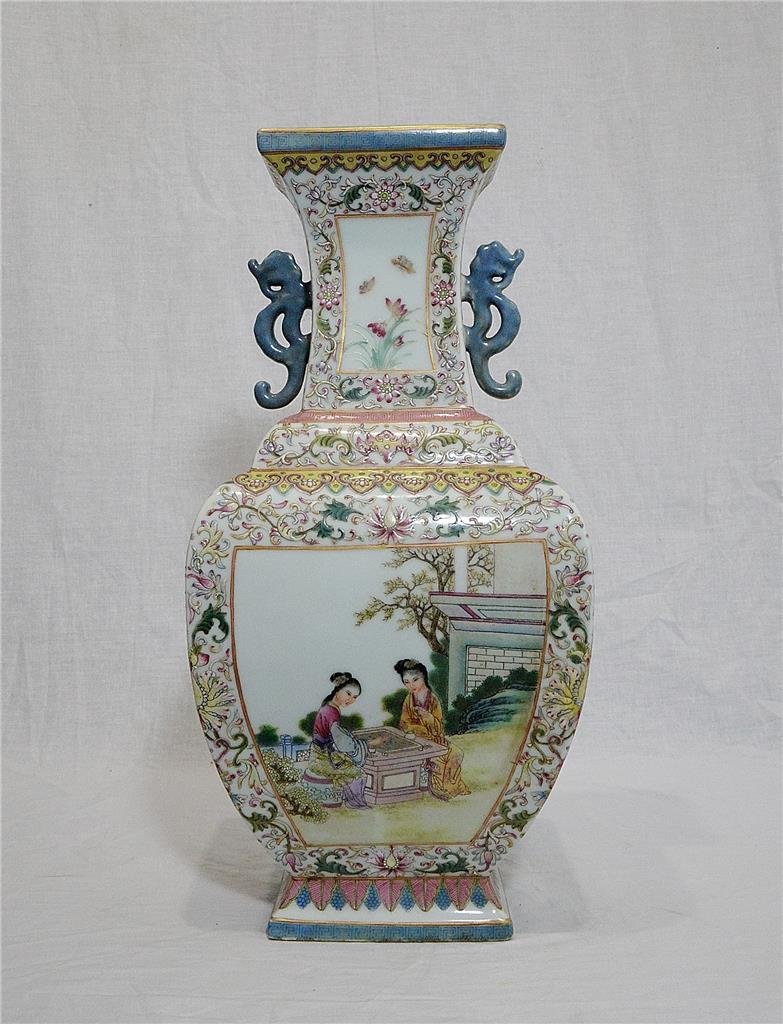 Large Chinese Famille Rose Porcelain Vase With Mark: Chinese famille rose porcelain vase, decorated with open window of lady figures and landscape view. Six red Chinese character mark on the base. Good condition. 17.25" height.