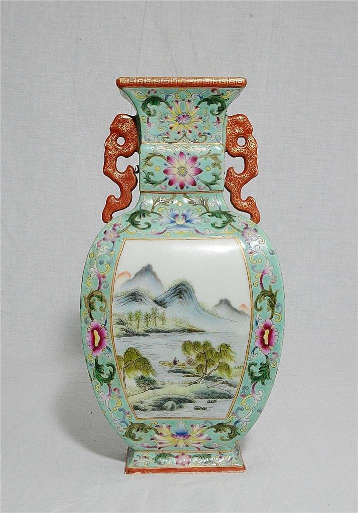 Chinese Famille Rose Porcelain Vase With Mark: Chinese famille rose porcelain vase, decorated with open window of landscape and mountain view. Six red Chinese character mark on the base. Good condition. 11.5" height.
