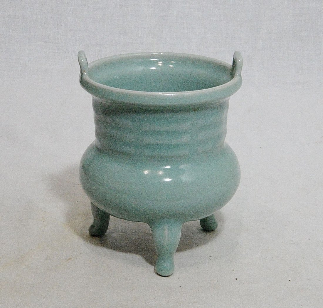 Chinese Tripod Celadon Porcelain Incese Burner: Chinese tripod celadon porcelain incense burner. Good condition. 4.75" height x 4.1" diam.