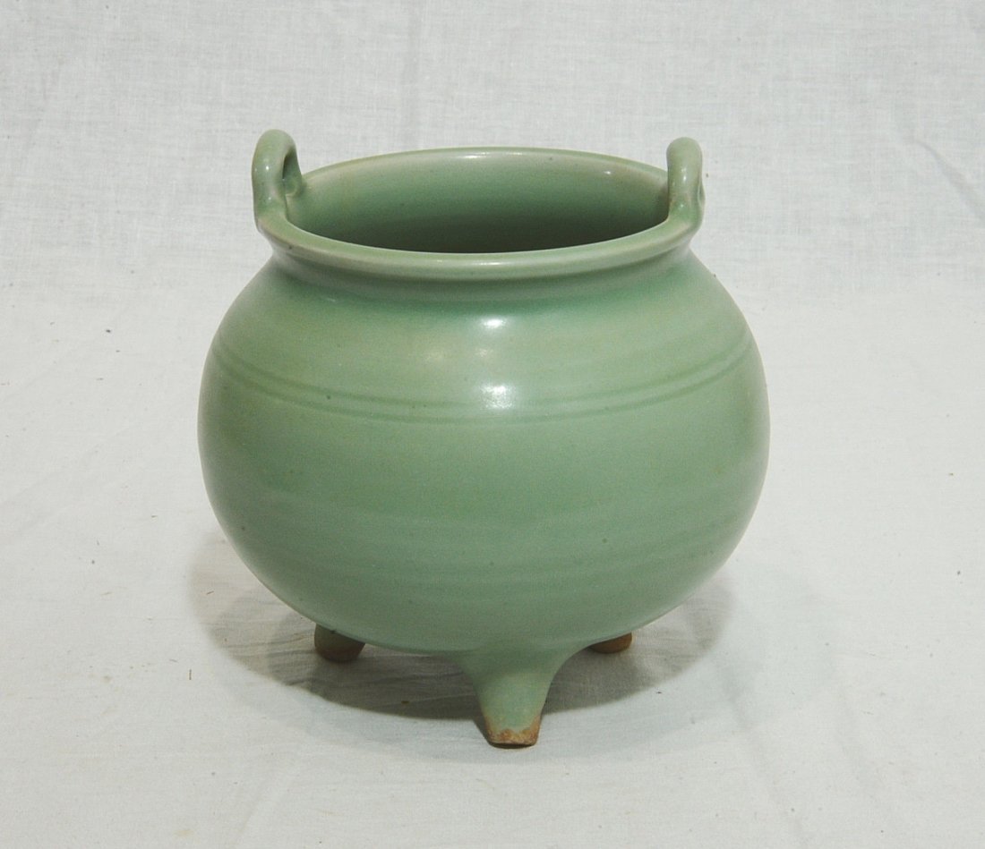 Chinese Celadon Tripod Porcelain Incense Burner: Chinese celadon tripod porcelain incense burner. Good condition. 5.75" wide x 5" height.