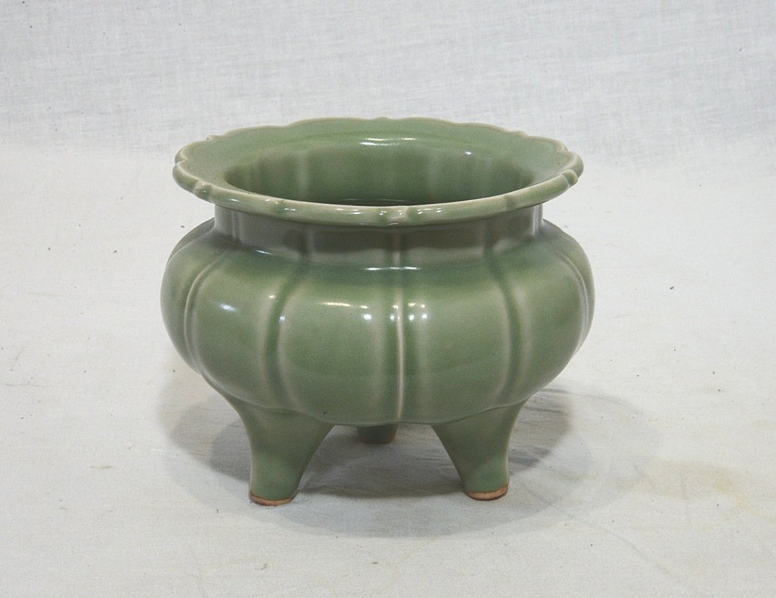 Chinese Celadon Tripod Porcelain Incense Burner: Chinese tripod celadon porcelain incense burner. Good condition. 5.5" wide x 4.6" height.