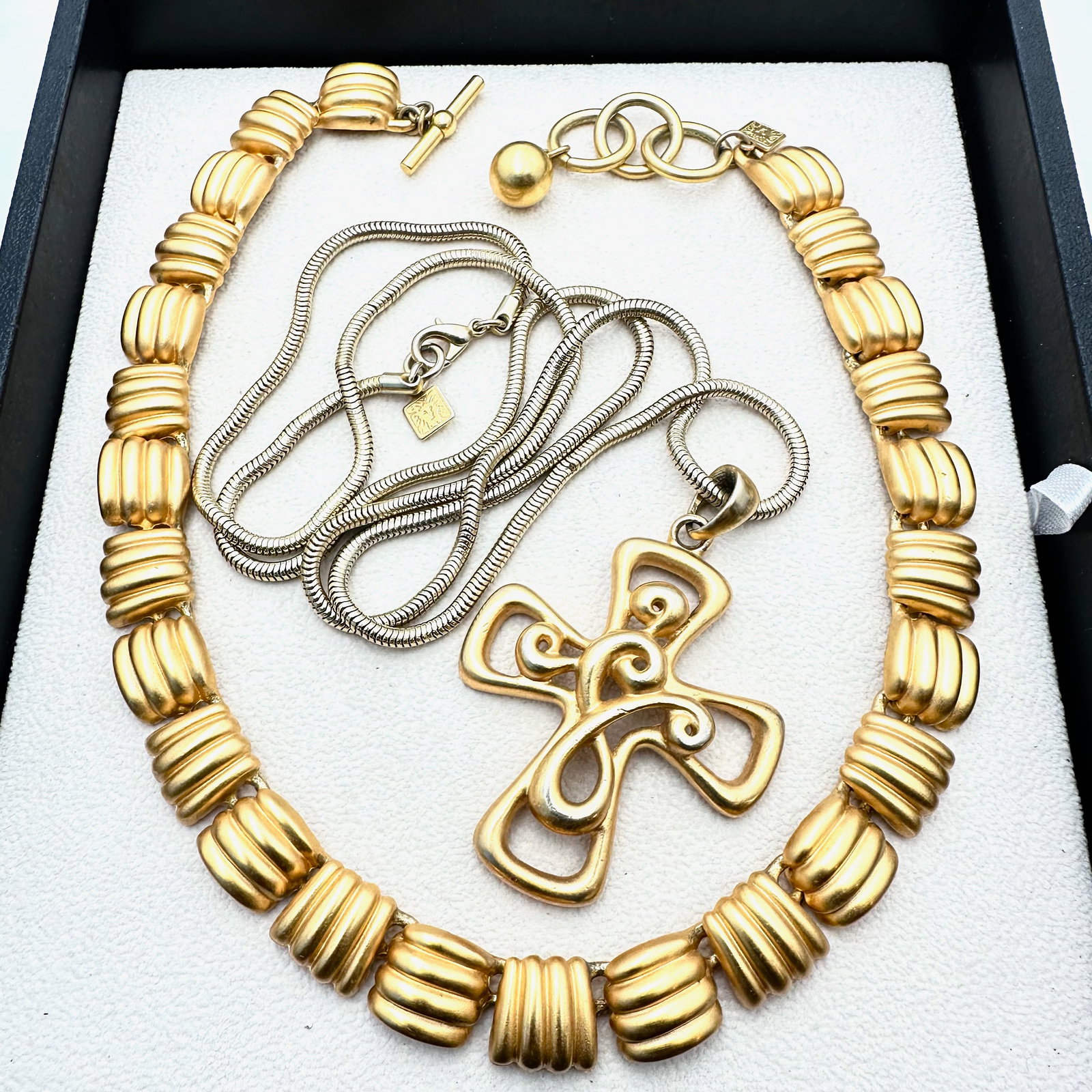 1980s Vintage Group of Two Anne Klein Matte Gold Tone Necklaces Cross: 1980s Vintage Group of Two Anne Klein Matte Gold Tone Necklaces Cross