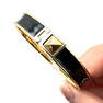 Kate Spade New York 6.5 Inch Black Enamel Gold Tone Bangle Bracelet
