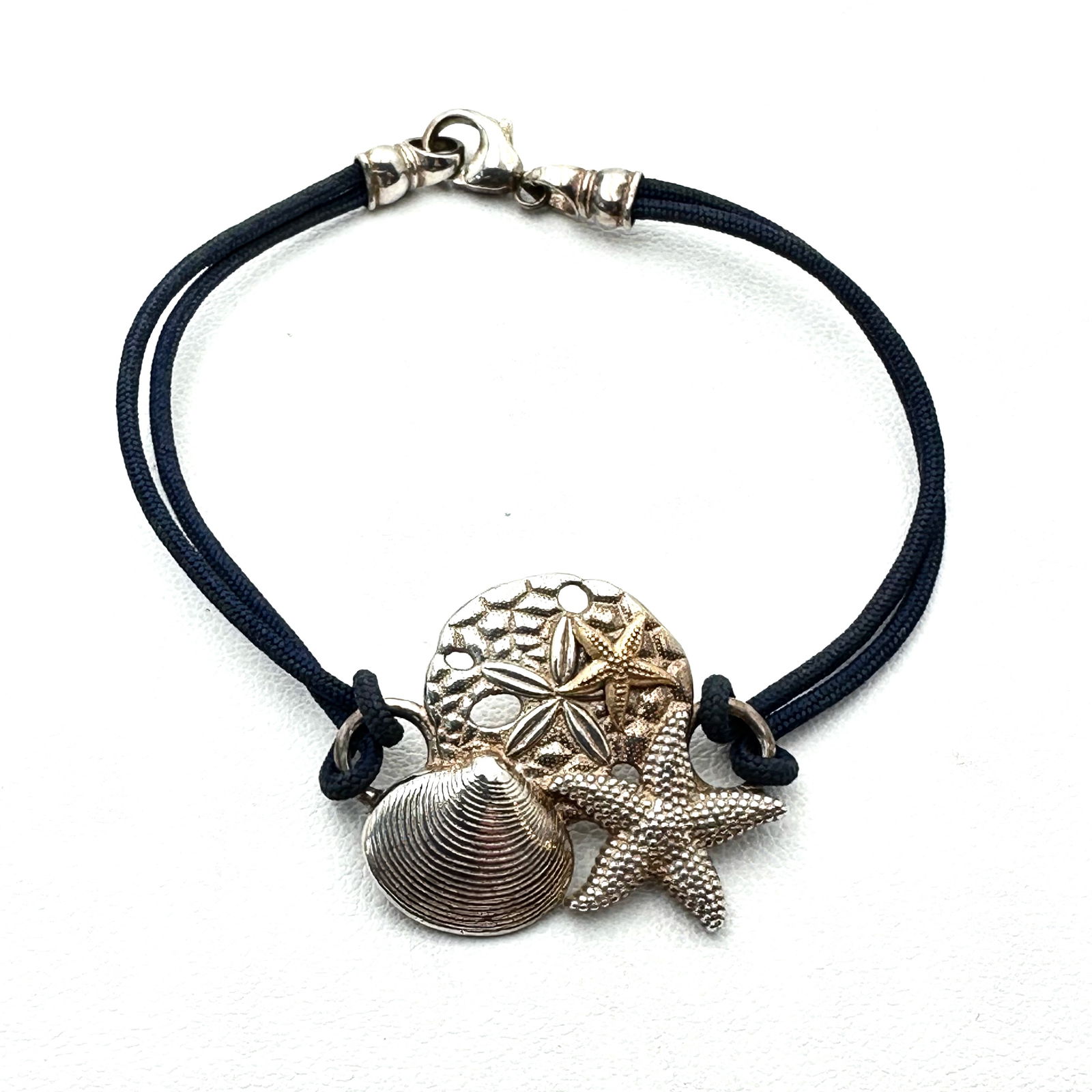 Shell Starfish Sterling Silver Bracelet Navy Blue Cord 6.5 Inch Length Beach Vacay (1 of 2)