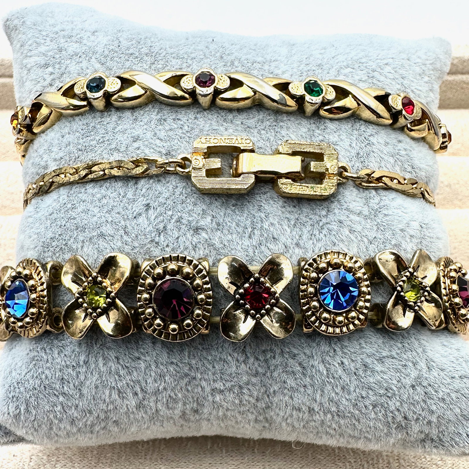 Group Lot of Gold Tone Bracelets One Signed Givenchy (1 of 2)