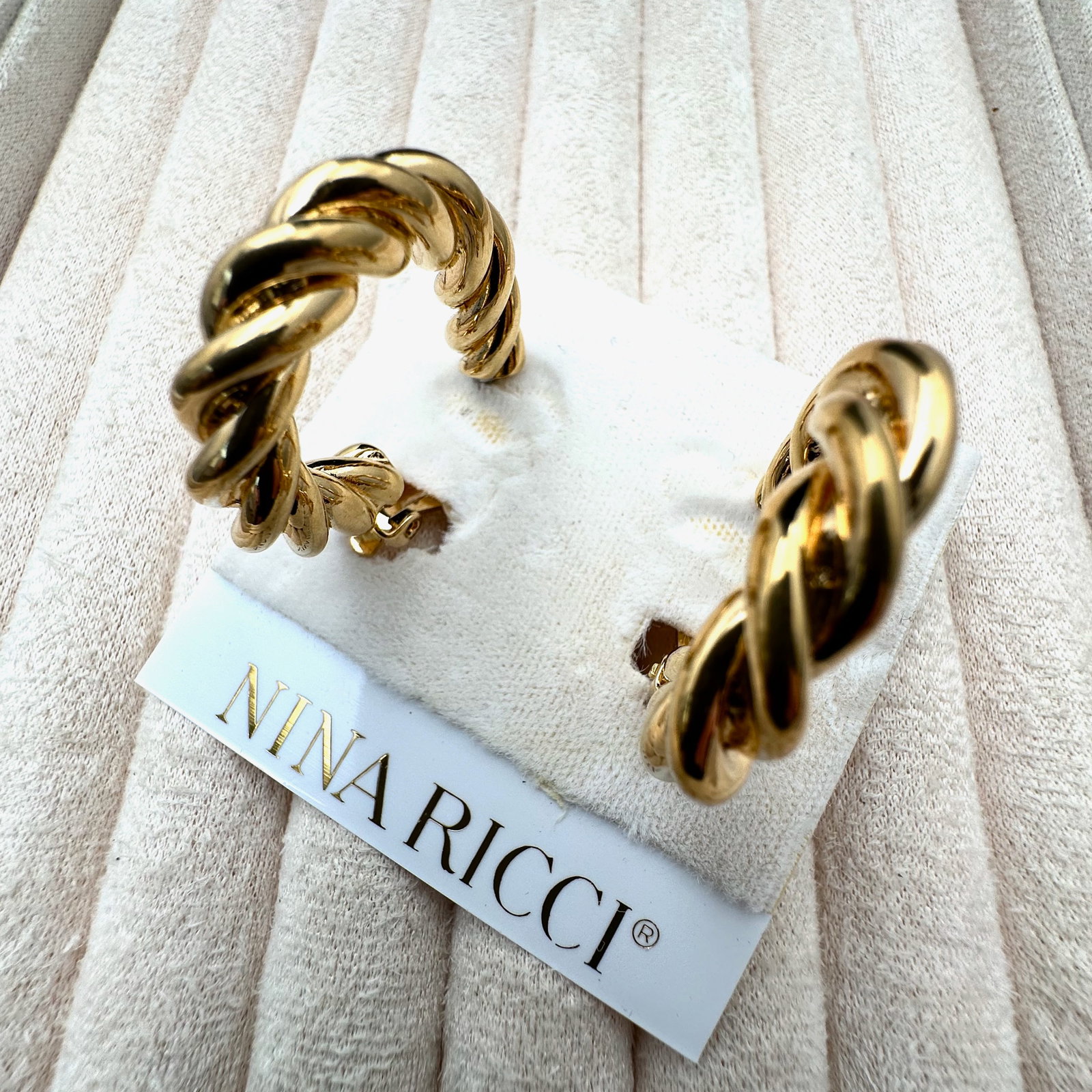 Vintage Nina Ricci Gold Tone Twisted 1.25 Inch Hoop Clip Earrings on Original Card (1 of 2)