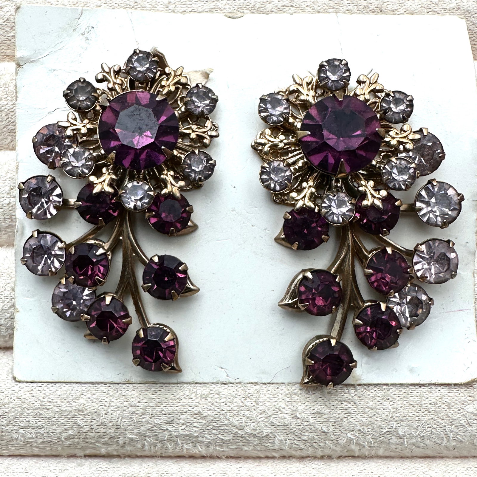Vintage Purple Glass Rhinestone Gold Tone Clip Earrings Original Card 2 Inch Length: Vintage Purple Glass Rhinestone Gold Tone Clip Earrings Original Card 2 Inch Length