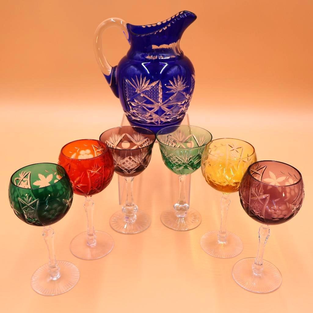 Nachtmann Traube Liqueur Glasses Lead Glasses: Stunning lead crystal champagne goblets or wine glasses with a cobalt blue pitcher.