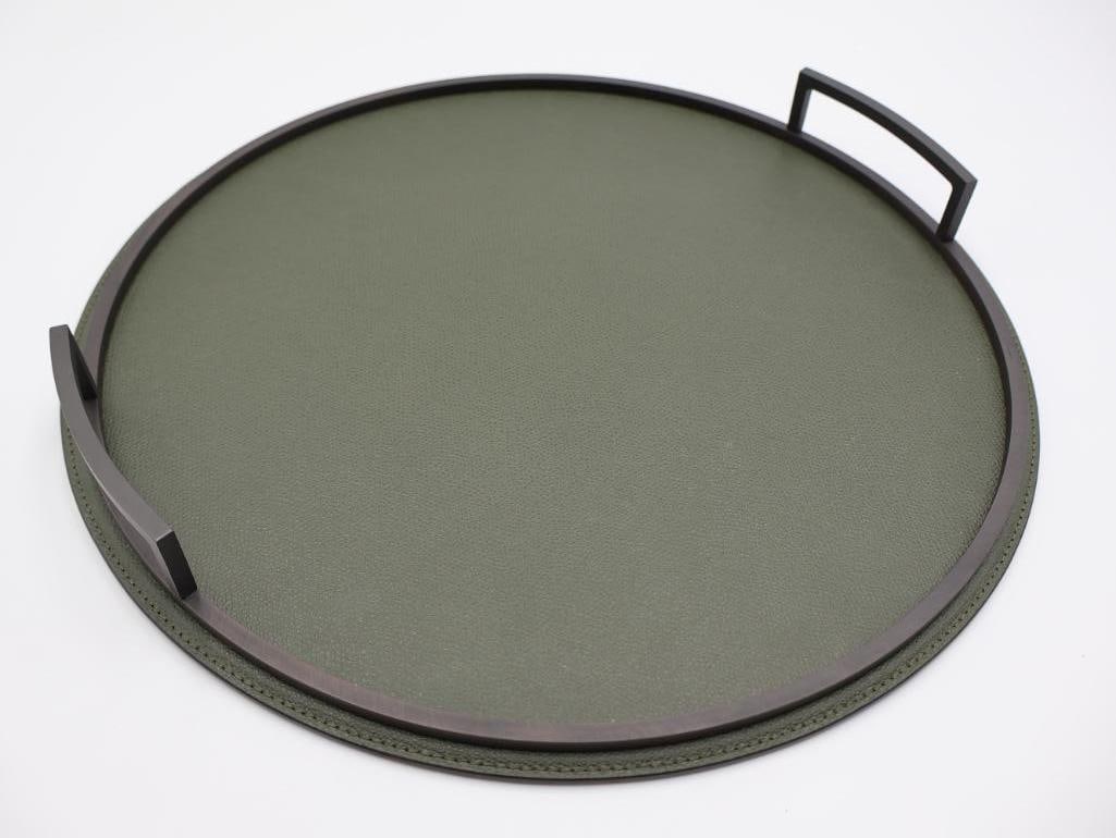 Luxury Brand Linley Evolution Round Leather Tray: Made in London, calfskin leather in Leaden Green color with brushed bronze finish frame