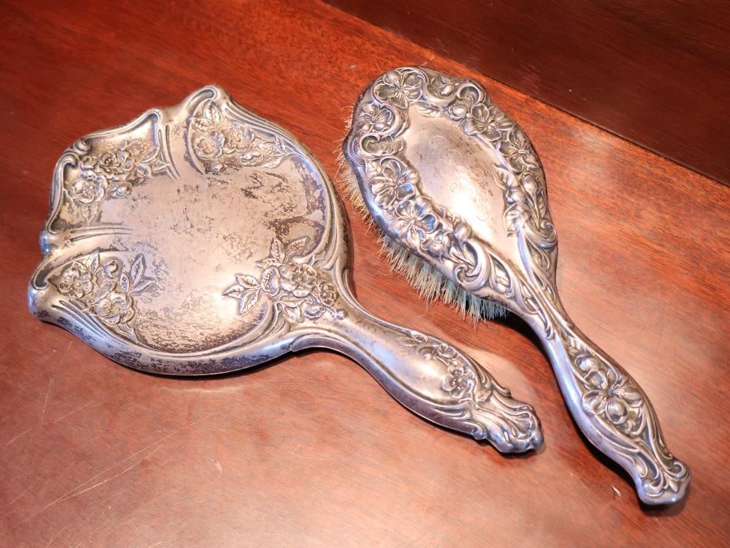 Antique Sterling Silver Handheld Mirror and Brush: Marked Sterling silver antique mirror with some patina, R.W.&S. with Stag emblem marked Sterling 3500