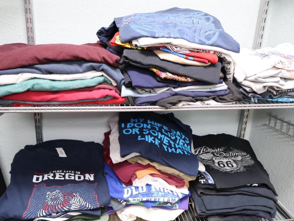 Large Collection of Used Graphic T-Shirts: Please view all photos taken for this lot to view sizes and condition. Includes Carhartt, travel, funny shirts, Oregon shirts, and so much more! Mostly 2XL or XL