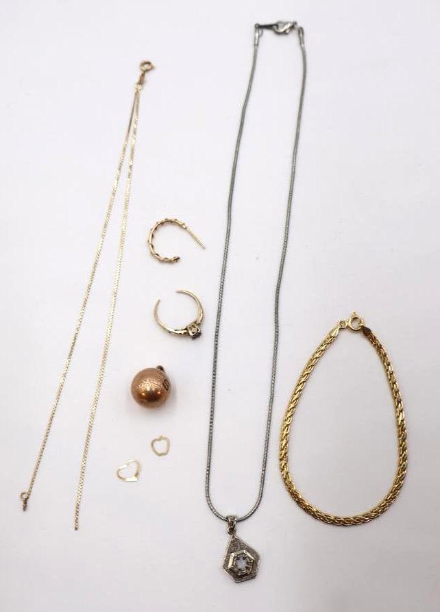 14k Gold Bracelet and More Mixed Gold Estate Jewelry: 14k Italy marked gold chain bracelet, 14k marked small apple and heart gold charms, 18kGF marked chain with 14k marked pendant missing stone, 10k narked baseball charm, one 14k marked hoop earring, 14