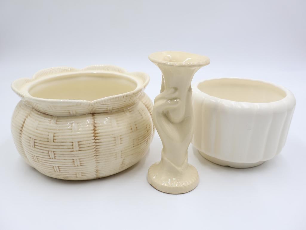 Three cream-colored ceramic flower pots (1 of 10)