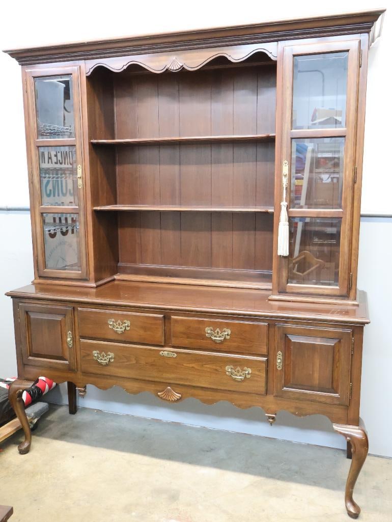 Ethan Allen Queen Anne style two-piece cherry china cabinet: Comes in two pieces, some scratches on top. View all photos for details and sizing. By placing a bid, you acknowledge that you have examined the item to your satisfaction and accept it in its current
