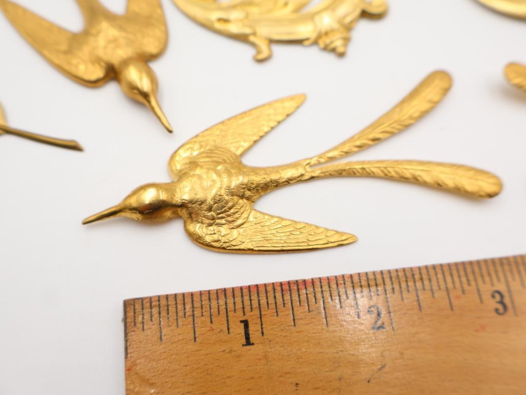 Brass swallow and orante stampings - 2