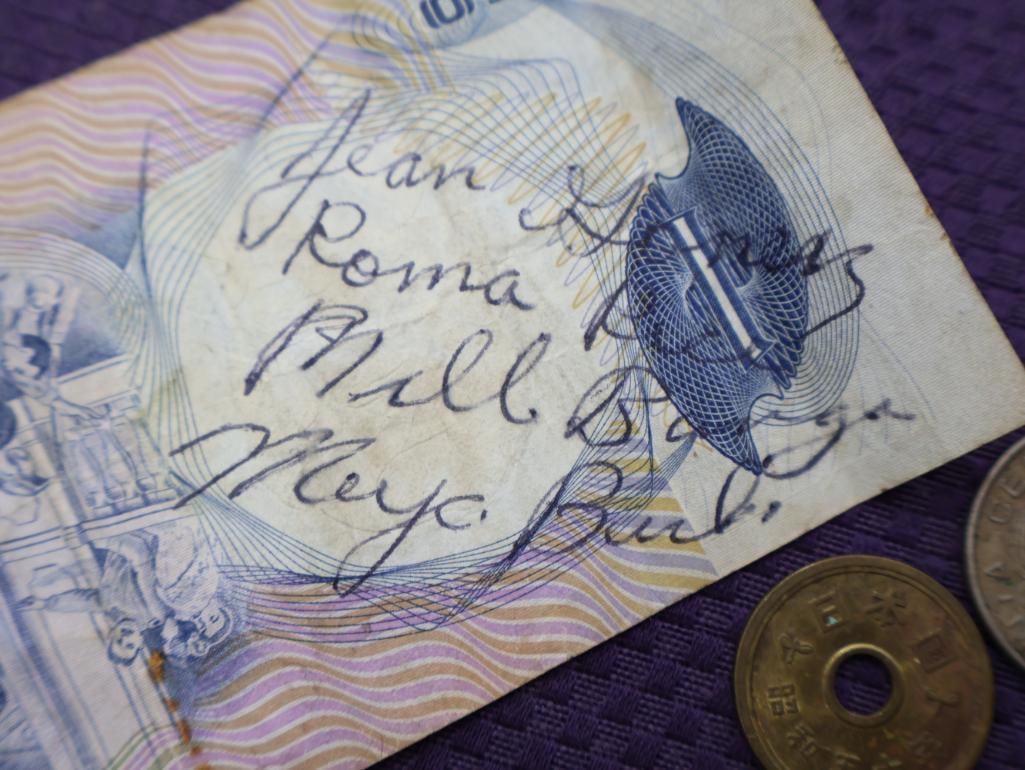 A collection of Philippine peso coins and a banknote - 10