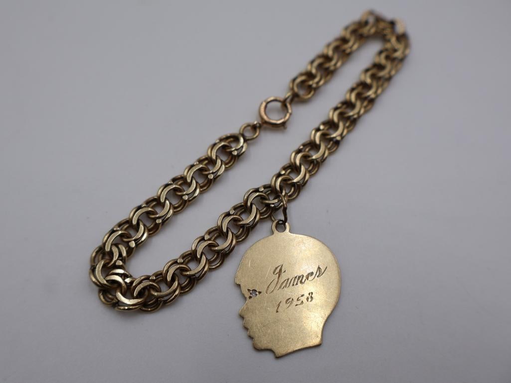 1958, 14k Charm bracelet with a silhouette head charm - 2