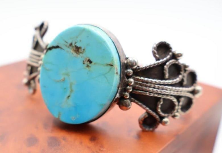 Vintage sterling silver cuff bracelet with a large, oval turquoise-colored stone - 2