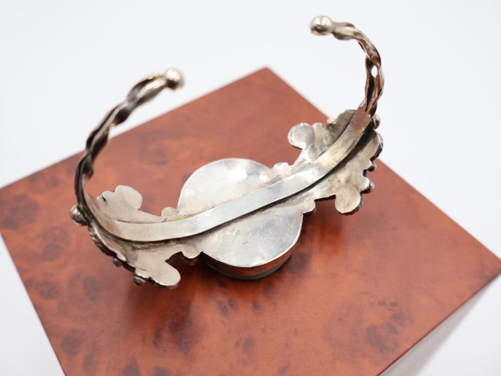 Vintage sterling silver cuff bracelet with a large, oval turquoise-colored stone - 6