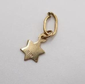 Collection of various gold jewelry charms - 10