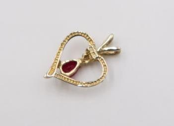 14k and 10k yellow gold pendants - 9