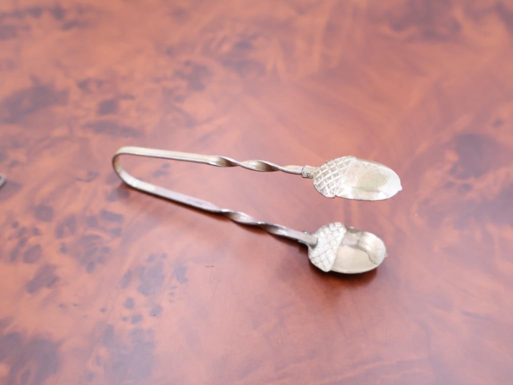 Collection of Antique Sterling Souvenir spoons and Acorn Tongs - 11