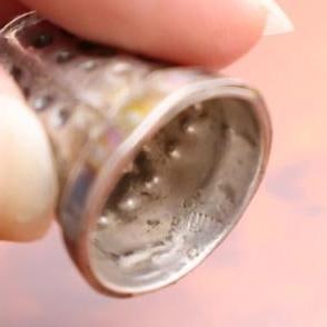 Collection of five sterling silver thimbles - 5