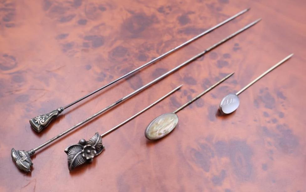 Antique Sterling Silver Tipped hat pins: The tops are made from sterling silver, some featuring stones 