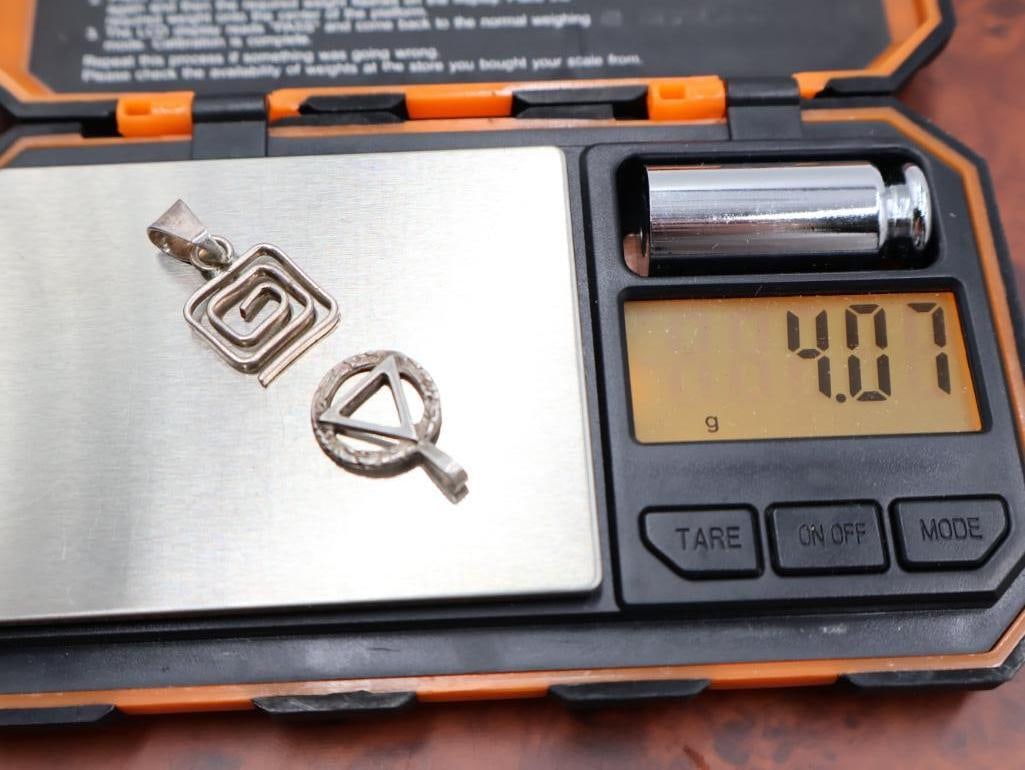 A red jade pendant and two sterling pendants - 6