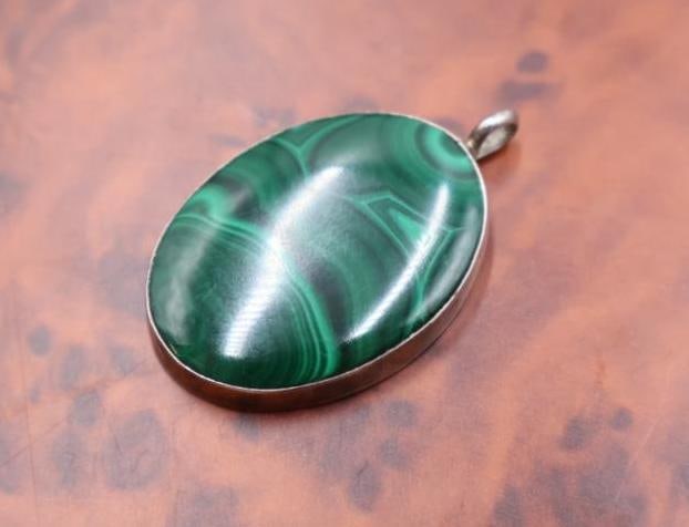 Oval malachite cabochon pendant set in sterling silver (1 of 4)