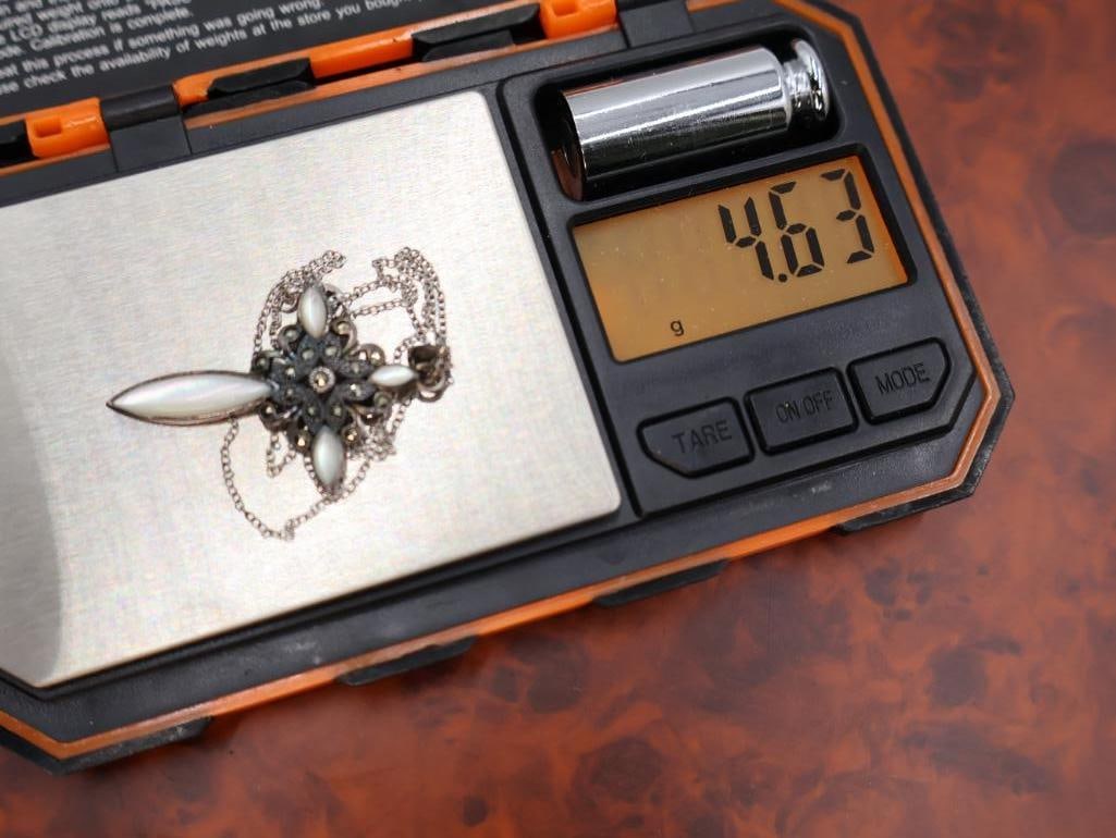 Sterling Silver mother-of-pearl cross pendant and the other a dove outline pendant - 6