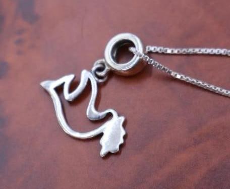 Sterling Silver mother-of-pearl cross pendant and the other a dove outline pendant - 7