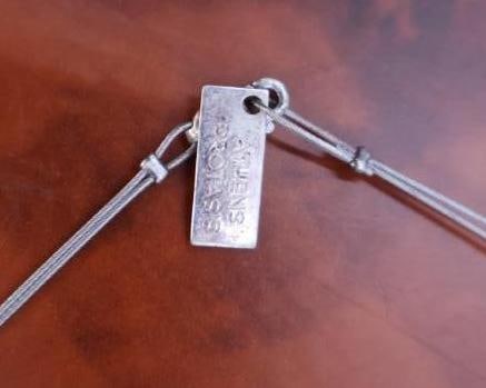 Collection of silver chokers, including Silver Stiff Choker - 12